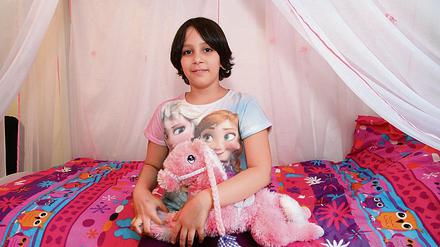 Hanita Mousavi, 8 Jahre alt, fotografiert im September 2015 in ihrem Kinderzimmer in Berlin-Pankow.