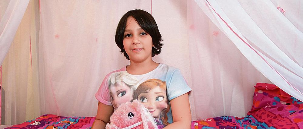 Hanita Mousavi, 8 Jahre alt, fotografiert im September 2015 in ihrem Kinderzimmer in Berlin-Pankow.