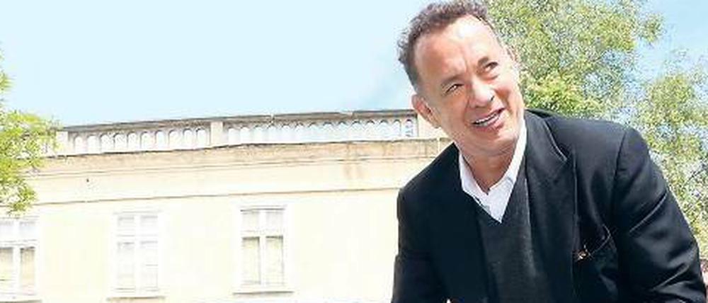 Go, Tom, go! Tom Hanks hat in Eisenhüttenstadt schon einmal einen Trabant gefahren. Derzeit steht er in Berlin vor der Kamera – natürlich in einem Ost-West-Drama. 