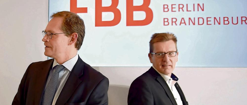 Kommen nicht zueinander: Berlins Regierender Bürgermeister Michael Müller (l.) und Flughafenchef Karsten Mühlenfeld.