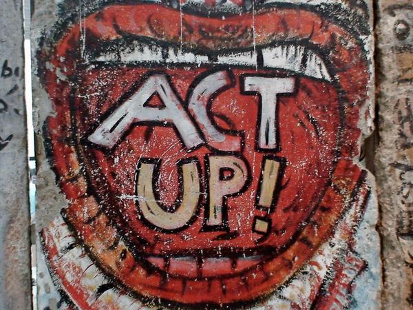 Ein Act Up-Graffiti an der Berliner Mauer. 