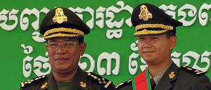 Er regiert seit 38 Jahren: Kambodschas Premierminister Hun Sen (l.) und sein Sohn Hun Manet, der das Amt seines Vaters erben soll.