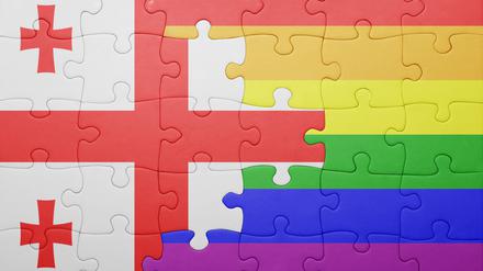 puzzle  with  the  national  flag  of  georgia  and  gay  flag.concept xkwx against,  association,  bad,  banner,  business,  capital,  central,  concept,  conflict,  contact,  country,  danger,  east,  economy,  eu,  europe,  european,  flag,  freedom,  friendship,  game,  gay,  georgia,  georgian,  jack,  lesbian,  lgbt,  love,  north,  opposition,  parade,  partner,  partnership,  peace,  policy,  power,  protest,  puzzle,  rainbow,  region,  relations,  right,  sign,  south,  symbol,  tbilisi,  territory,  union,  west,  world