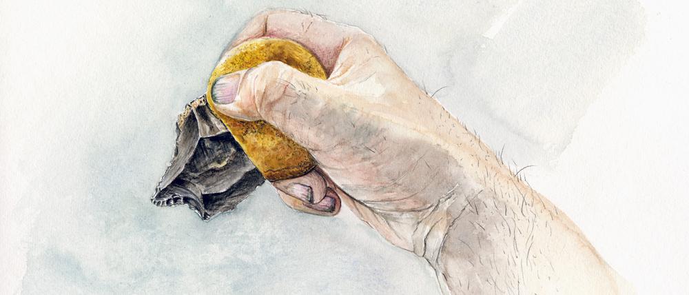 Zeichnung eines Steinwerkzeugs und seinem Griff aus Bitumen-Knete. 