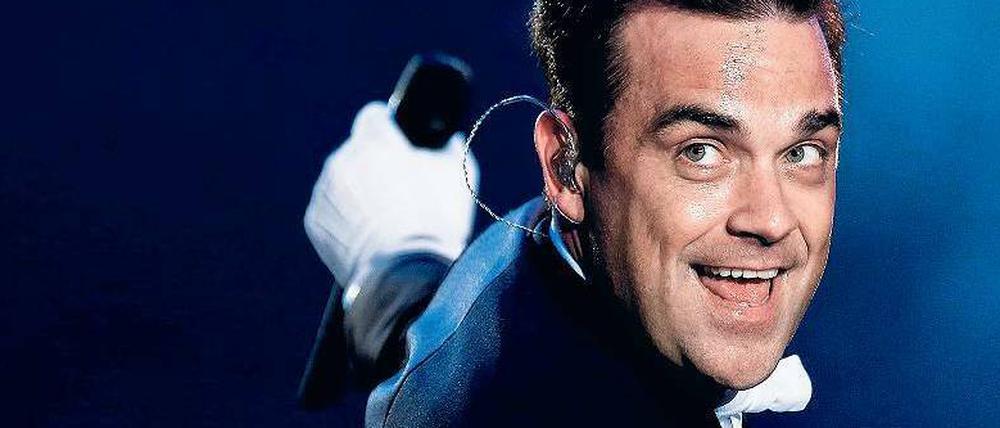 Achtung, hier kommt ein Swing-Pirat: Robbie Williams fegt über das Showdeck – egal, ob der Hafen Helsinki, Lissabon oder Berlin heißt.