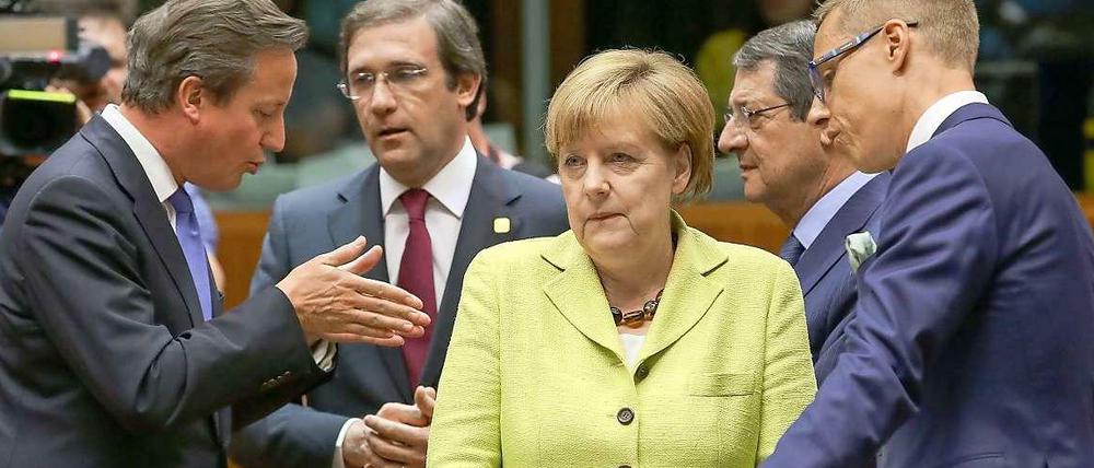 Bundeskanzlerin Angela Merkel beim EU-Gipfel im Kreis der Kollegen.