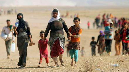 Flüchtlinge im Irak. Deutschland will die Kurden im Kampf gegen die IS-Dschihadisten mit Ausrüstung unterstützen.