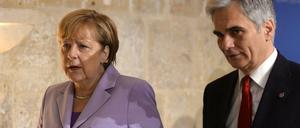 Bundeskanzlerin Angela Merkel und Österreichs Kanzler Werner Faymann auf einem Archivbild vom 12. November 2015.