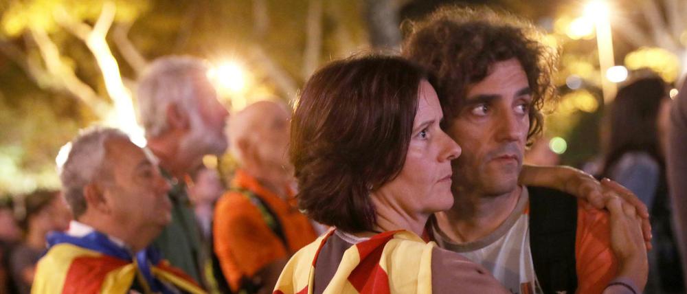 Unsicherheit: Zuhörer bei der Rede des katalanischen Ministerpräsidenten in Barcelona 