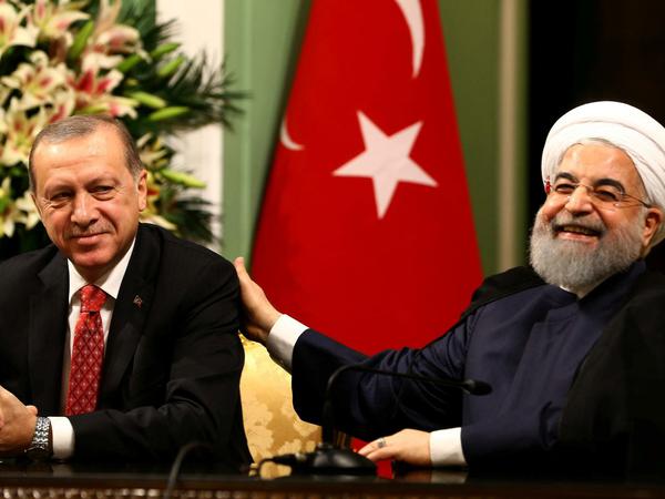 Ziemlich gute Freunde. Der türkische Präsident Erdogan besucht seinen Amtskollegen Ruhani.