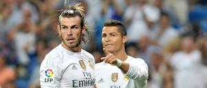 Der? Nein ICH! Real soll für Ronaldo (rechts, vorne Bale) insgesamt fast 105 Millionen Euro gezahlt haben.