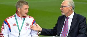 Verschiedener Meinung: Bastian Schweinsteiger (links) und Franz Beckenbauer.