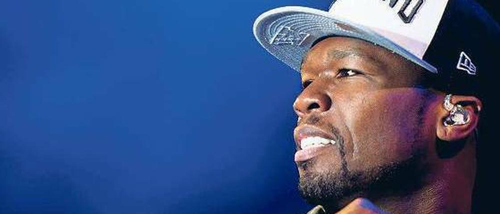 Mit Mützchen und dicker Kette. Curtis James Jackson stammt wie jeder anständige Rapper aus New York und hat einen bescheidenen Künstlernamen: 50 Cent. 