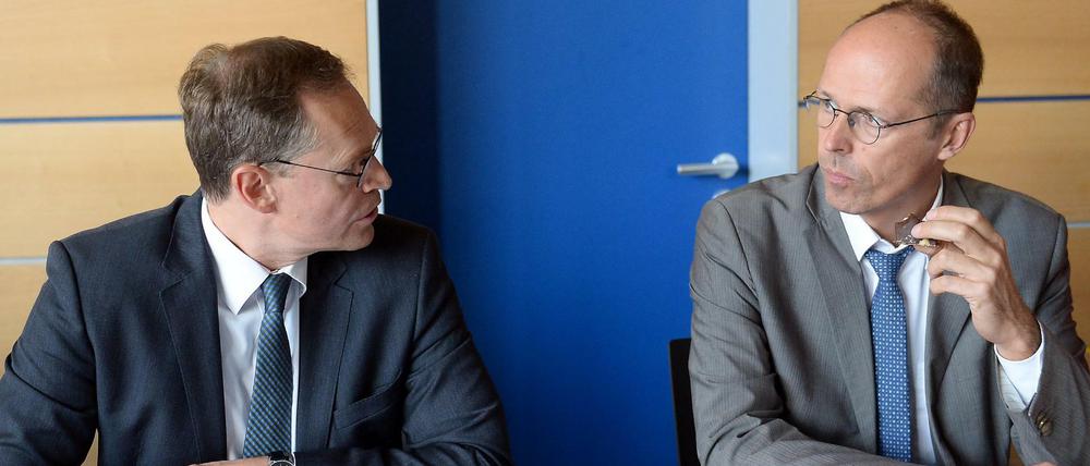Berlins Regierungschef Müller (l.) und der zurückgetretene stellvertretende SPD-Landesvorsitzende Rackles.