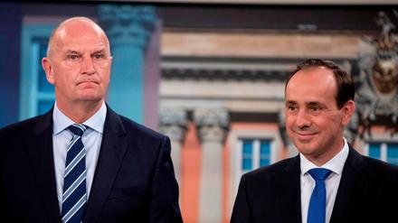Top candidate of the conservative Christian Democratic Union (CDU) party, Ingo Senftleben (L) and Brandenburg&amp;apos;s State Premier and top candidate of the social democratic SPD party Dietmar Woidke take part in a TV show at the German channel ARD following the results of the exit polls during the state elections in Brandenburg on September 1, 2019 in Potsdam, eastern Germany. - The far-right Alternative for Germany party surged strongly in elections in two eastern states, public television exit polls said, reflecting anger with Chancellor Angela Merkel&amp;apos;s coalition government. In Saxony, the anti-immigration AfD scored 27.5 percent, up sharply from 9.7 percent five years ago, broadcasters ARD and ZDF forecast. (Photo by Christoph Soeder / POOL / AFP)