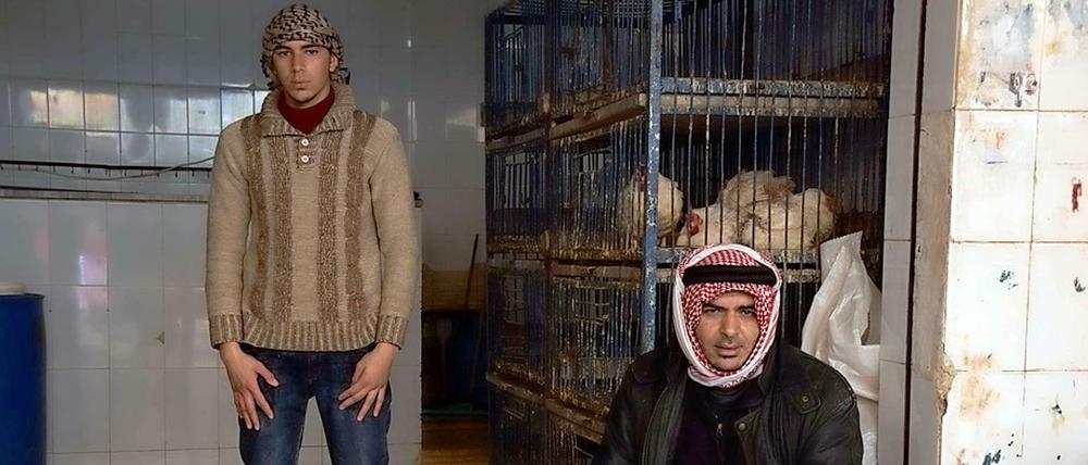 Zuflucht Amman: Geflügelhändler am Rande des Wochenmarkts im palästinensischen Flüchtlingscamp Baqa'a.