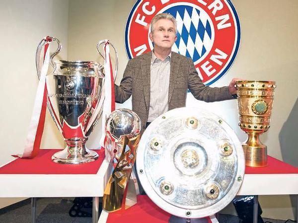 Dreifache Krönung. 2013 gewann Heynckes mit dem FC Bayern das Triple aus Champions League, Meisterschaft und DFB-Pokal.