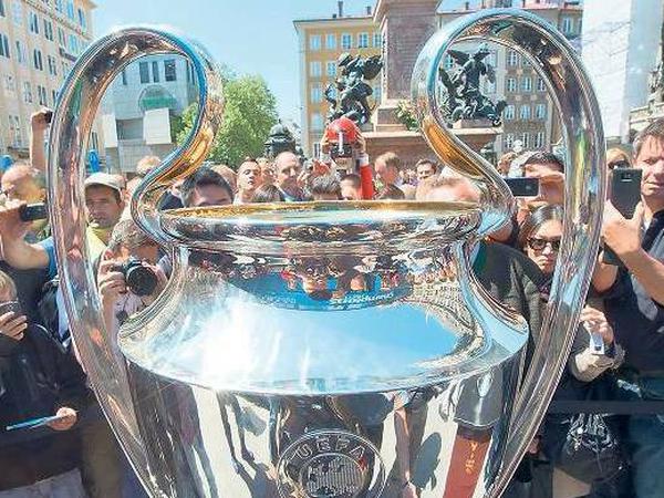 Objekt der Begierde: der Pokal. Die Champions League zielt auf ein weites Publikum.