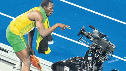 Berlin, Olympiastadion, August 2009. Ausnahmesprinter Usain Bolt posiert nach dem Sieg in der Sprint-Staffel. Solche Live-Momente werden die Zuschauer bei der nächsten Leichtathletik-WM via ARD und ZDF wahrscheinlich nicht sehen können. Foto: ddp