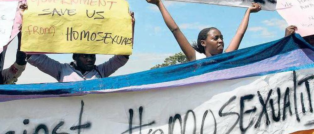 Vereint in der Ablehnung. Das Anti-Homosexuellen-Gesetz in Uganda ist sehr populär. Viele Ugander – wie diese Demonstranten in Kampala – halten Homosexualität für einen westlichen Sittenverfall, der nichts mit afrikanischen Werten zu tun hat. 