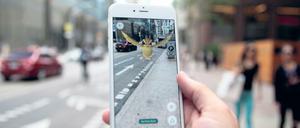 Ein Nutzer findet ein "Pidgey" in der Smartphone-App Pokémon Go (Symbolbild).