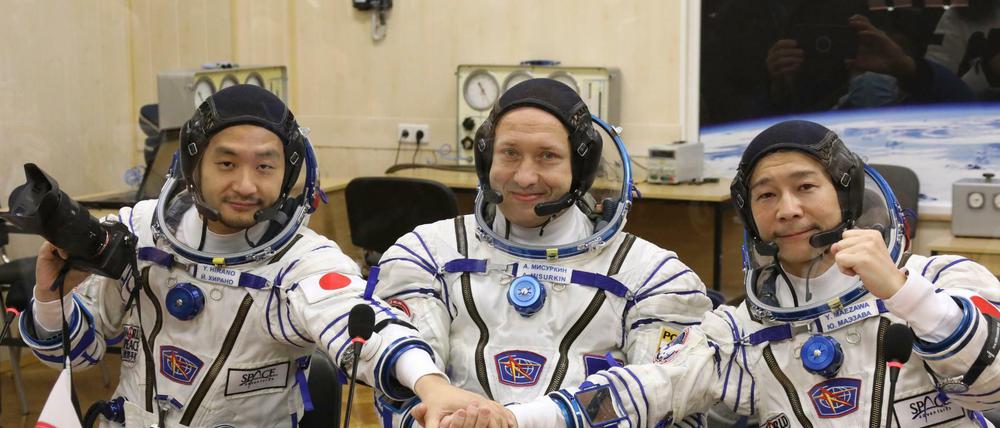 Gemeinsam zur ISS. Hirano, Missurkin und Maezawa (von links).