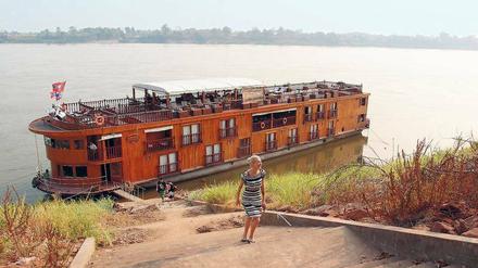 Wenig Tiefgang. Die „Mekong Explorer“, ganz aus Holz gebaut, kann nahezu überall anlegen. So entdecken Touristen Regionen, die zu Fuß kaum erreichbar sind.