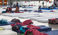 Zahlreiche Flüchtlinge Am 7.10.2015 in einer Halle auf dem Messegelände Stuttgart.