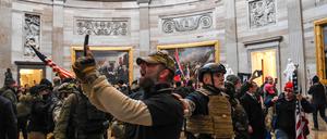 Supporters of US President Donald Trump enter the US Capitol’s Rotunda on January 6, 2021, in Washington, DC. 