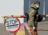 Ein Mitglied des ukrainischen Staatsgrenzschutzdienstes Foto: REUTERS/Gleb Garanich