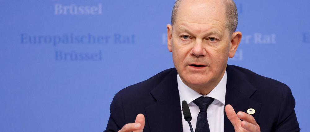 Germany’s Chancellor Olaf Scholz gestures during a press conference at the end of the European Council summit at the EU headquarters in Brussels, on April 18, 2024.