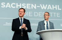 Spitzenkandidaten Michael Kretschmer (CDU, links), Jörg Urban (AfD) vergangene Woche bei einer Podiumsdiskussion zur Landtagswahl in Dresden. Foto: Robert Michael/dpa