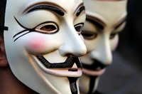 Die für Anonymous typischen Guy-Fawkes-Masken. Foto: REUTERS/Stefano Rellandini