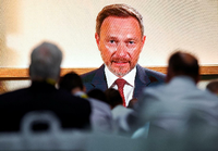 Finanzminister Lindner virtuell zugeschaltet auf dem FDP-Parteitag. Foto: REUTERS/Michele Tantussi