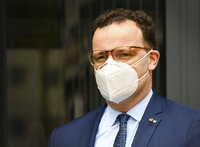 Gesundheitsminister Jens Spahn trägt eine Maske. Foto: imago images/Hollandse Hoogte