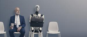 Wer bekommt den Job: der Mensch oder der Roboter? (Symbolbild zur Zukunft der Arbeit).