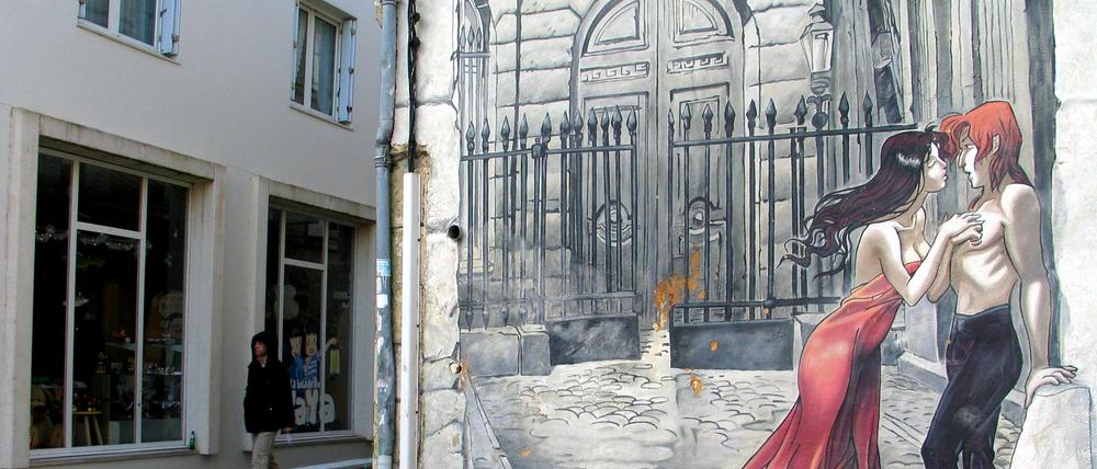 It's a Man's World. Angoulême ist für sein Comicfestival berühmt - und für seine damit korrespondierenden Wandgemälde. Dieses stammt von Comiczeichner Yslaire.