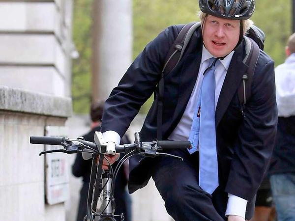 It's about the bike: Boris Johnson, the Mayor of London, trying his best to be down to earth.
