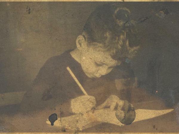 The great British painter Frank Auerbach as a child, drawing in his hometown Berlin., around 1935