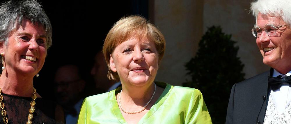 Bestens gelaunt. Angela Merkel mit der Bayreuther Bürgermeisterin Brigitte Merk-Erbe und ihrem Mann Thomas Erbe.
