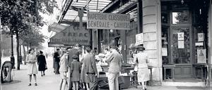 Heute befindet sich hier immer noch die Librairie Gilbert. Der Pariser Boulevard Saint-Michel um 1938/39. Foto: ullstein bild/Roger Viollet