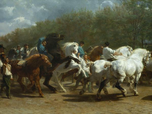Rosa Bonheurs Ölgemälde vom Pariser Pferdemarkt (1852/55) auf dem Boulevard de l’Hôpital. Die Malerin selbst ist in der Bildmitte zu sehen, verkleidet als männlicher Reiter mit Schiebermütze, äh, Reiterkappe. 