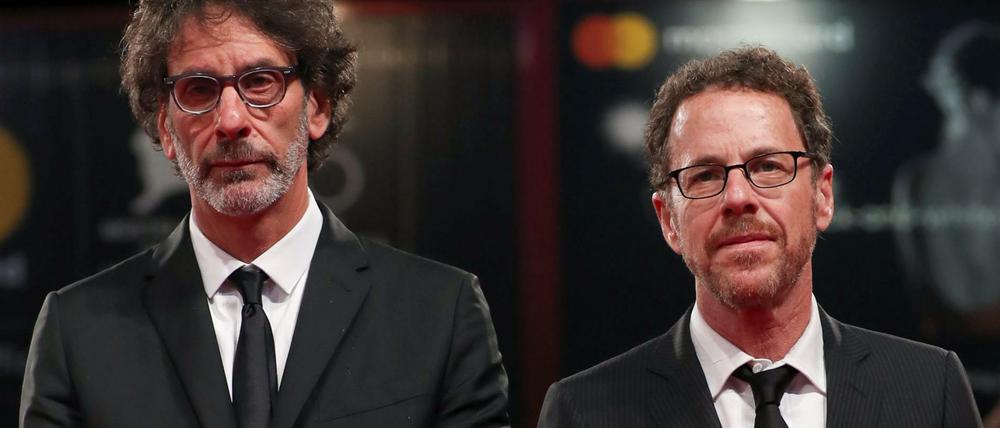 The 75th Venice International Film Festival - ?Screening of the film "The Ballad of Buster Scruggs" competing in the Venezia 75 section - Red Carpet Arrivals - Venice, Italy, August 31, 2018 - Directors Ethan Coen and Joel Coen pose. REUTERS/Tony Gentile