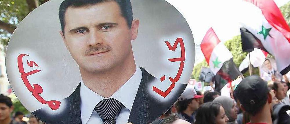 Eine Demonstration von Pro-Assad-Anhängern in Syrien.