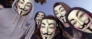 Internetaktivisten von Anonymous mit der typischen Guy Fawkes-Maske.