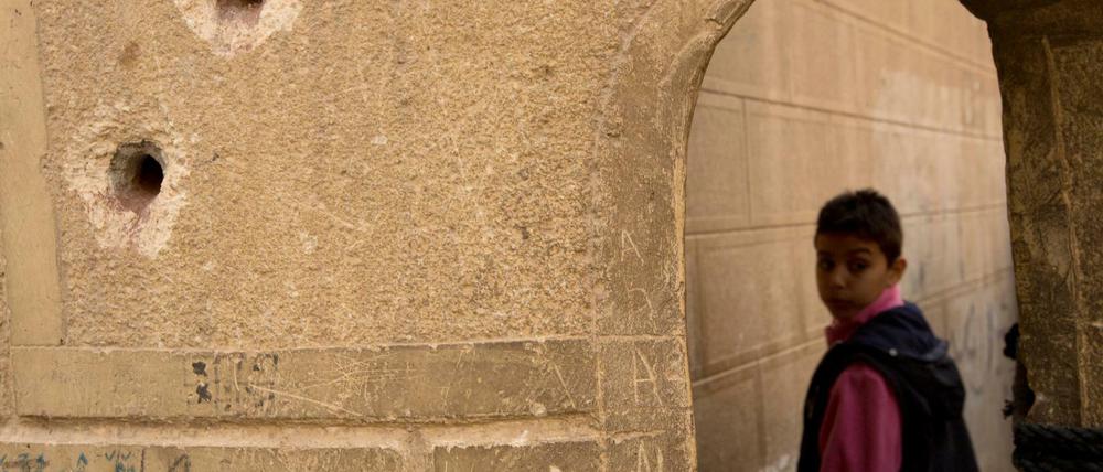 Einschusslöcher an der Fassade der St.Mina-Kirche in Ägypten.