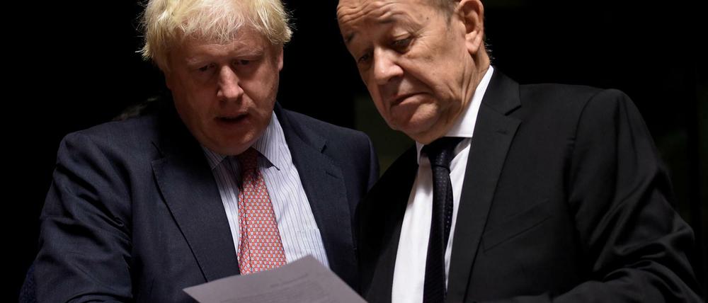 Der britische Außenminister Boris Johnson und sein französischer Kollege Jean Yves Le Drian.