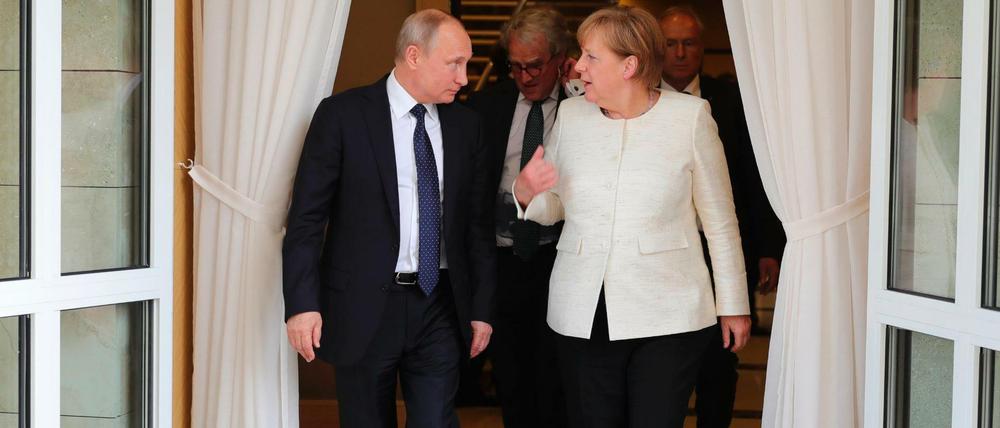 Bundeskanzlerin Angela Merkel (CDU) und Wladimir Putin, Präsident von Russland, nach ihrem Treffen.