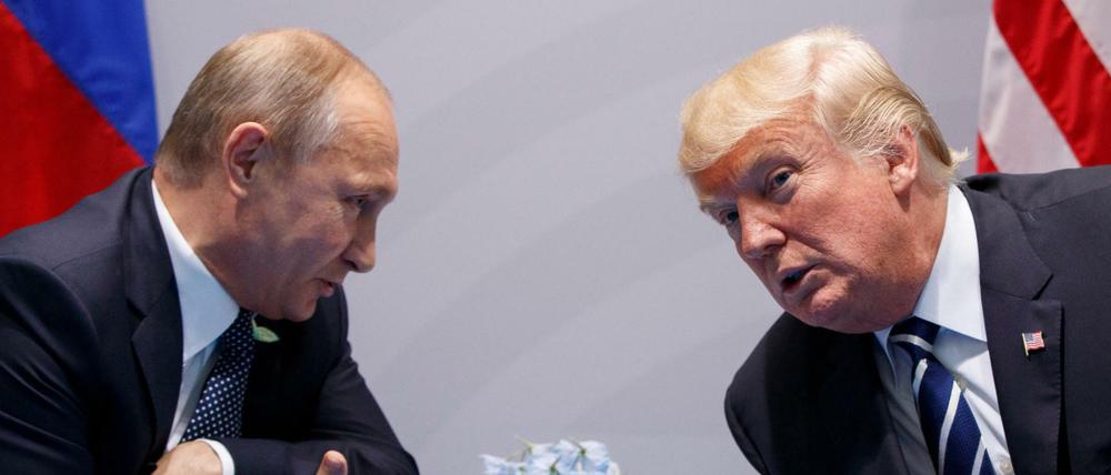 Wladimir Putin und Donald Trump sprechen während des G20-Gipfels in Hamburg. 