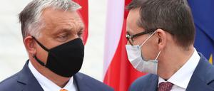 Geben sie jetzt im EU-Haushaltsstreit nach? Mateusz Morawiecki (r), Premierminister von Polen, und Viktor Orban, Premierminister von Ungarn.